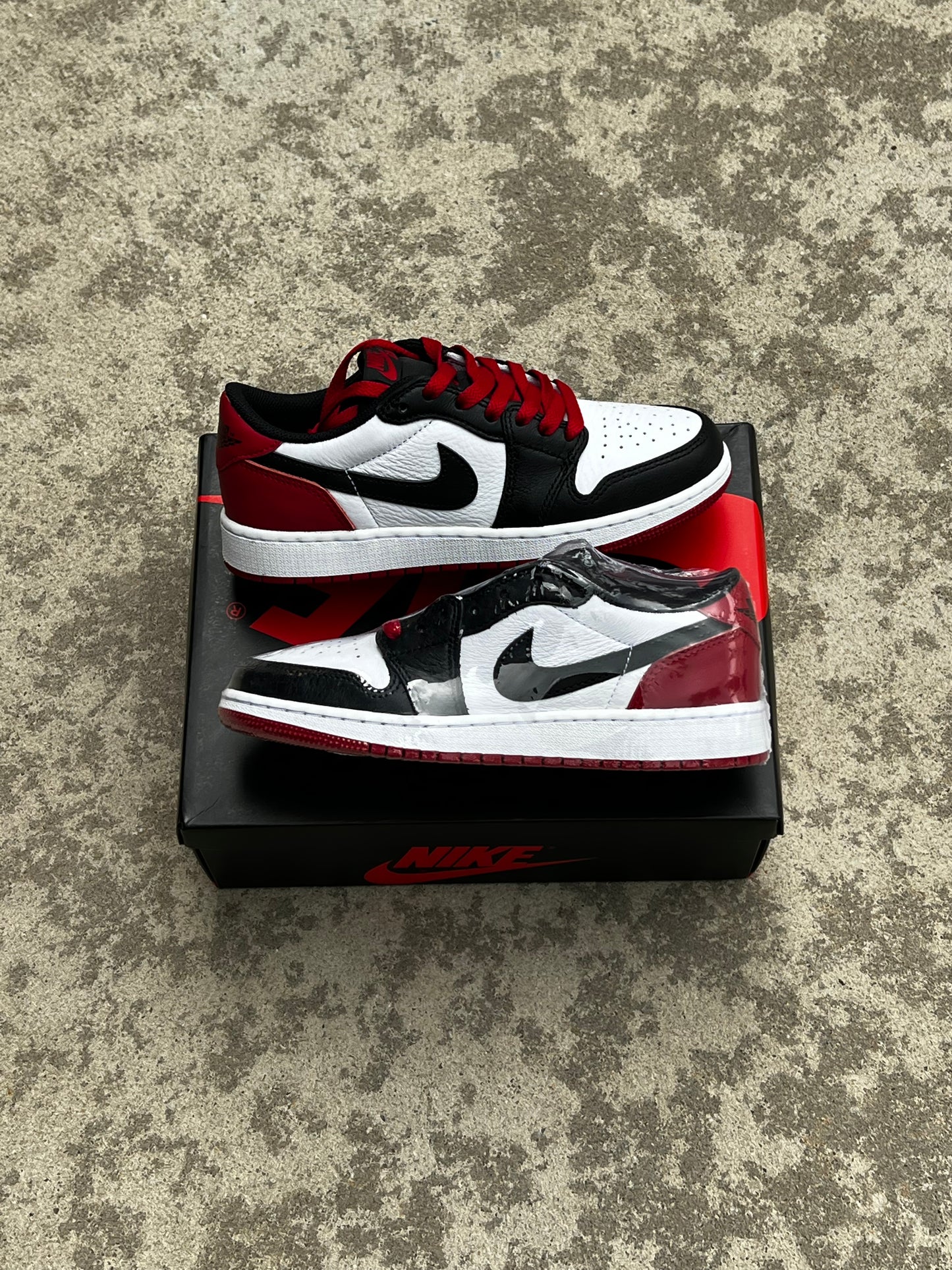 Jordan 1 Low Black Toe (4.5)